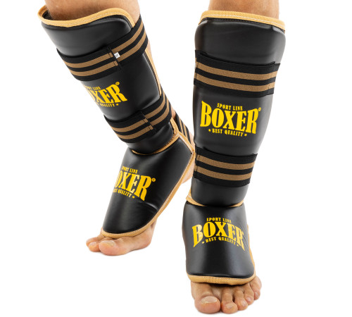 Захист гомілки та стопи Муай Тай, ММА, Кікбоксинг штучна шкіра BOXER NEW M-XL кольори в асортименті